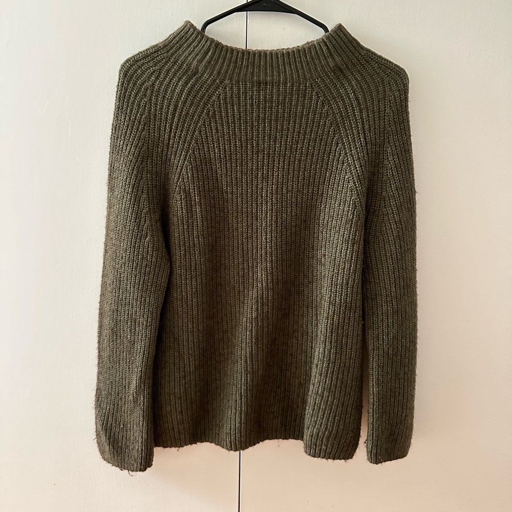green wool sweater